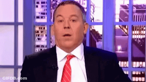 A Man In A Suit And Red Tie Is Making A Surprised Face . GIF