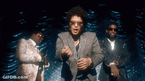 A Man In A Suit And Sunglasses Is Dancing With Two Other Men In Suits . GIF