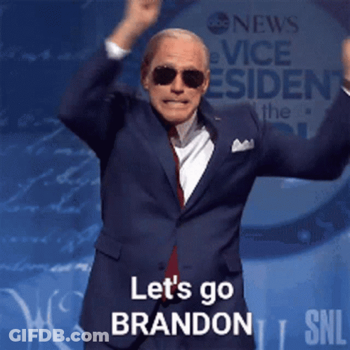 A Man In A Suit And Sunglasses Says Let 'S Go Brandon On Snl GIF
