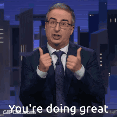 A Man In A Suit And Tie Giving A Thumbs Up With The Words You 'Re Doing Great Written Below Him GIF