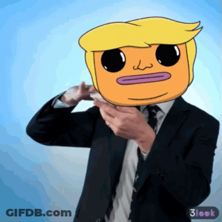 A Man In A Suit And Tie Has A Cartoon Face On His Face GIF