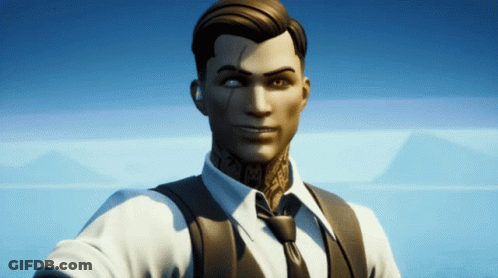 A Man In A Suit And Tie Has A Tattoo On His Face GIF