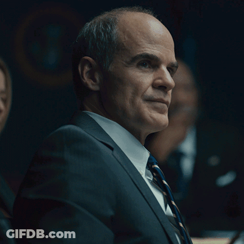 A Man In A Suit And Tie Has Correct Written On The Bottom GIF