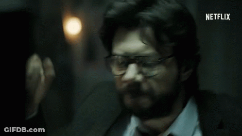 A Man In A Suit And Tie Has Netflix Written On The Bottom Right GIF
