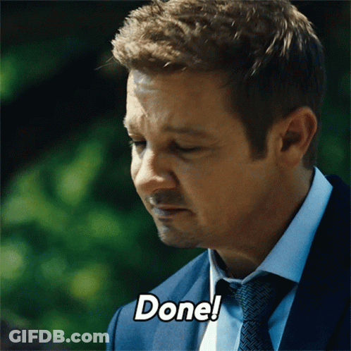 A Man In A Suit And Tie Has The Word Done On His Face GIF