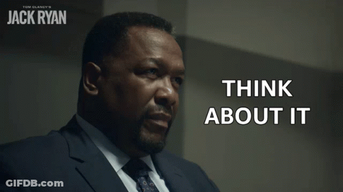 A Man In A Suit And Tie Has The Words Think About It Written On His Face GIF