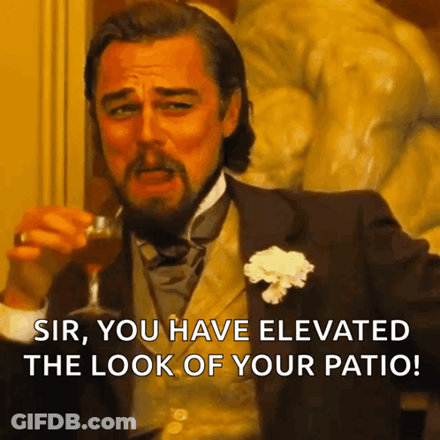 A Man In A Suit And Tie Holds A Glass Of Wine And Says Sir You Have Elevated The Look Of Your Patio GIF