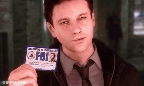 A Man In A Suit And Tie Holds Up A Badge From The Department Of Investigation Fbi GIF