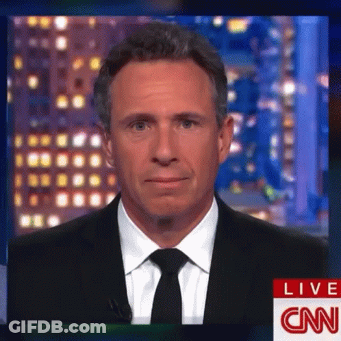 A Man In A Suit And Tie Is Appearing On Cnn GIF