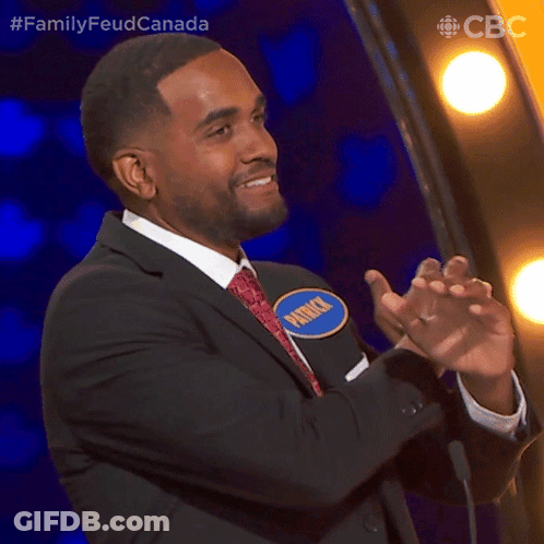A Man In A Suit And Tie Is Applauding And Has A Name Tag That Says Patrick GIF