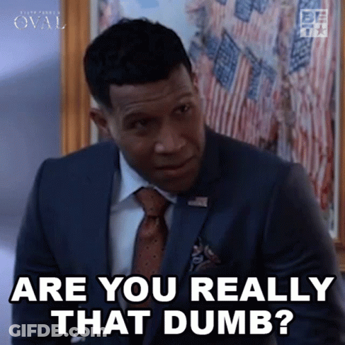 A Man In A Suit And Tie Is Asking Are You Really That Dumb . GIF
