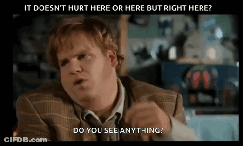 A Man In A Suit And Tie Is Asking If He Can See Anything GIF