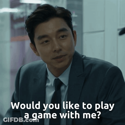 A Man In A Suit And Tie Is Asking If He Would Like To Play A Game With Him GIF