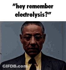 A Man In A Suit And Tie Is Asking Someone If They Remember Electrolysis . GIF