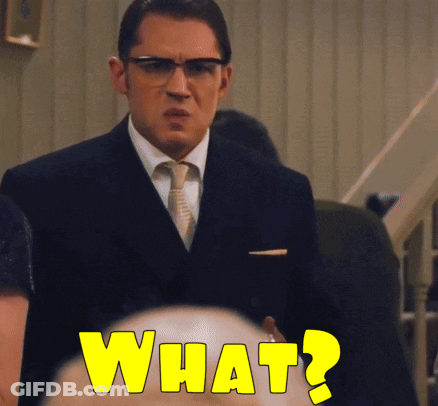 A Man In A Suit And Tie Is Asking The Question What GIF