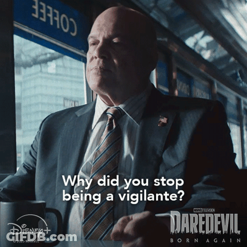 A Man In A Suit And Tie Is Asking Why Did You Stop Being Vigilante GIF