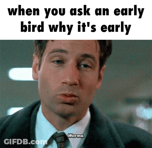 A Man In A Suit And Tie Is Asking Why It 'S Early GIF