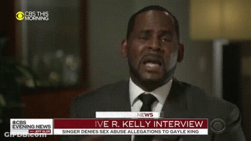A Man In A Suit And Tie Is Being Interviewed On Cbs Evening News GIF