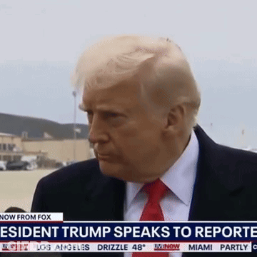 A Man In A Suit And Tie Is Being Interviewed On Fox News GIF