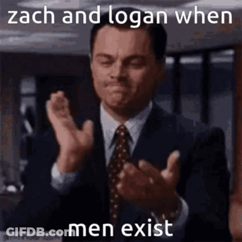 A Man In A Suit And Tie Is Clapping His Hands And Says Zach And Logan When Men Exist GIF