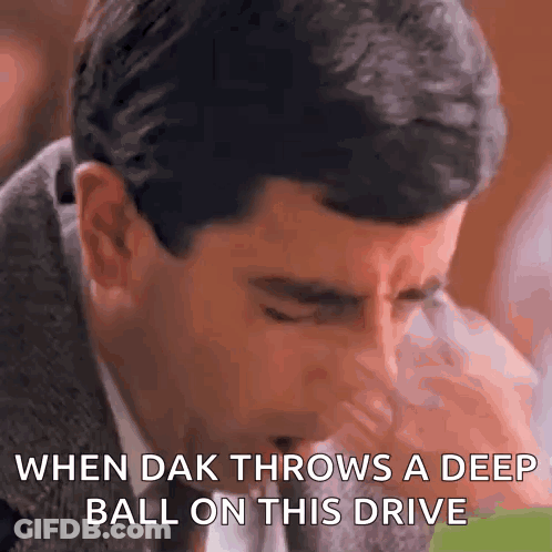 A Man In A Suit And Tie Is Coughing While Saying " When Dak Throws A Deep Ball On This Drive " GIF