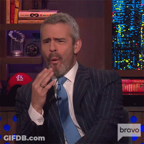 Man In Suit Covering Mouth With Bravo Text GIF