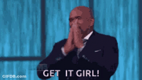 A Man In A Suit And Tie Is Covering His Mouth With His Hands And Says Get It Girl ! GIF