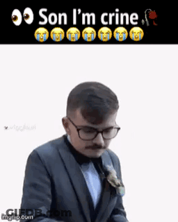 A Man In A Suit And Tie Is Crying With A Caption That Says Son I 'M Crine .. GIF