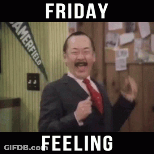 A Man In A Suit And Tie Is Dancing In A Room With The Words Friday Feeling . GIF