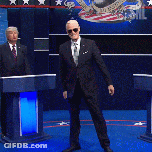 Man In Suit Dancing In Front Of SNL Podium GIF