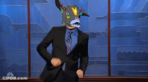 Man In Suit Dancing In Front Of NBC Window GIF
