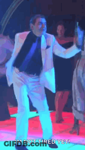 Man In Suit Dancing Says Im Not Tired Yet GIF