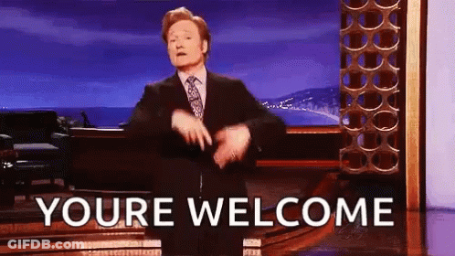A Man In A Suit And Tie Is Dancing On A Stage With The Words `` Youre Welcome '' . GIF