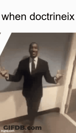 A Man In A Suit And Tie Is Dancing With His Arms Outstretched In A Hallway . GIF