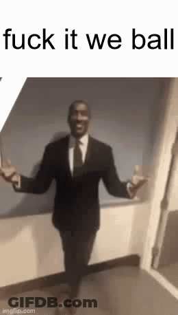 A Man In A Suit And Tie Is Dancing With His Arms Outstretched In A Hallway . GIF
