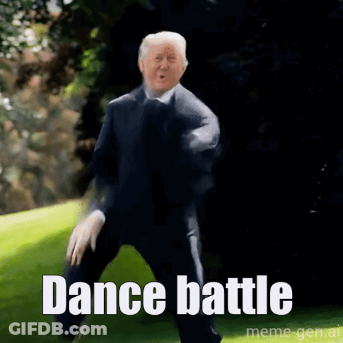 A Man In A Suit And Tie Is Dancing With The Words Dance Battle Above Him GIF
