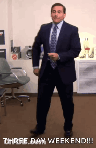 A Man In A Suit And Tie Is Dancing With The Words Three Day Weekend GIF