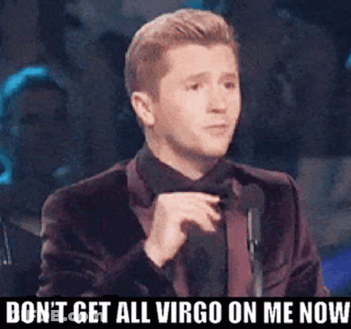 A Man In A Suit And Tie Is Giving A Speech And Says " Do N't Get All Virgo On Me Now " GIF