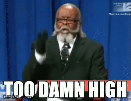 A Man In A Suit And Tie Is Giving A Speech And Says Too Damn High GIF