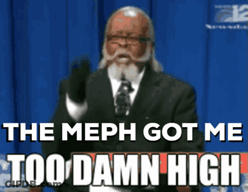 A Man In A Suit And Tie Is Giving A Speech And The Meph Got Me Too Damn High GIF