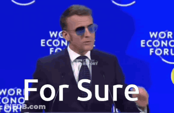 A Man In A Suit And Tie Is Giving A Speech And The Words For Sure Are On The Screen Behind Him GIF