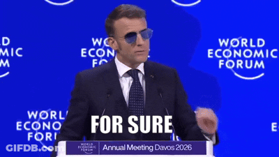A Man In A Suit And Tie Is Giving A Speech At The World Economic Forum Annual Meeting GIF