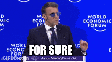 A Man In A Suit And Tie Is Giving A Speech At The World Economic Forum Annual Meeting GIF