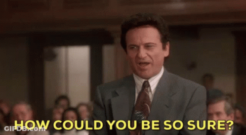 A Man In A Suit And Tie Is Giving A Speech In Front Of A Crowd And Says How Could You Be So Sure . GIF