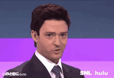 A Man In A Suit And Tie Is Giving A Speech On Nbc . GIF
