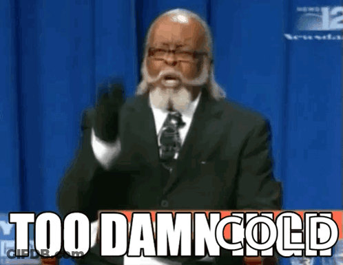 A Man In A Suit And Tie Is Giving A Speech That Says Too Damn Cold GIF