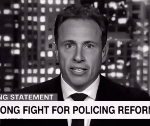 A Man In A Suit And Tie Is Giving A Statement About A Long Fight For Police Reform GIF