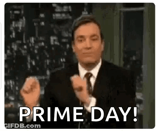 A Man In A Suit And Tie Is Giving A Thumbs Up Sign . GIF