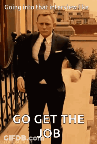 A Man In A Suit And Tie Is Going Into An Interview GIF
