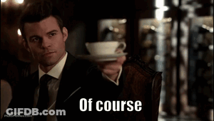 A Man In A Suit And Tie Is Holding A Cup Of Coffee With The Words Of Course Written On The Bottom GIF